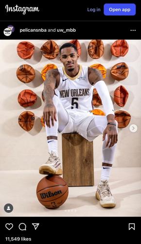 Dejounte Murray sits in front of deflated basketballs on Instagram